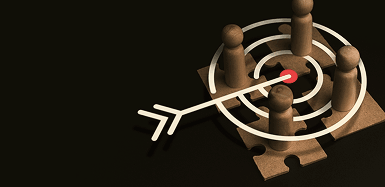 An arrow striking the center of a target surrounded by wooden peg figures